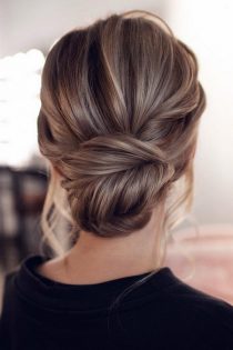 20 Trendy Low Bun Wedding Updos and Hairstyles 2024