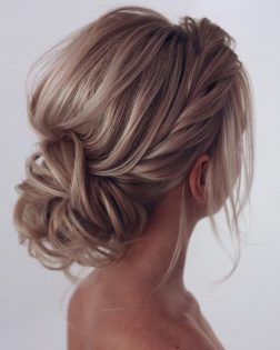 20 Trendy Low Bun Wedding Updos and Hairstyles 2024